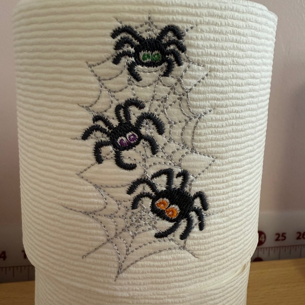 holiday embroidered toilet paper, black spiders stack for Halloween